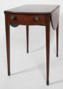 A Regency mahogany and line inlaid oval Pembroke table,