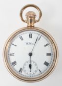 A gold plated open face Waltham pocket watch. Circular white dial with roman numerals.