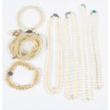 A collection of pearl jewellery to include: A cultured pearl necklace,