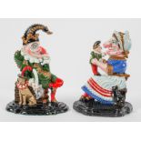 Two 20th century painted cast iron door stops, modeled as Punch and Judy,