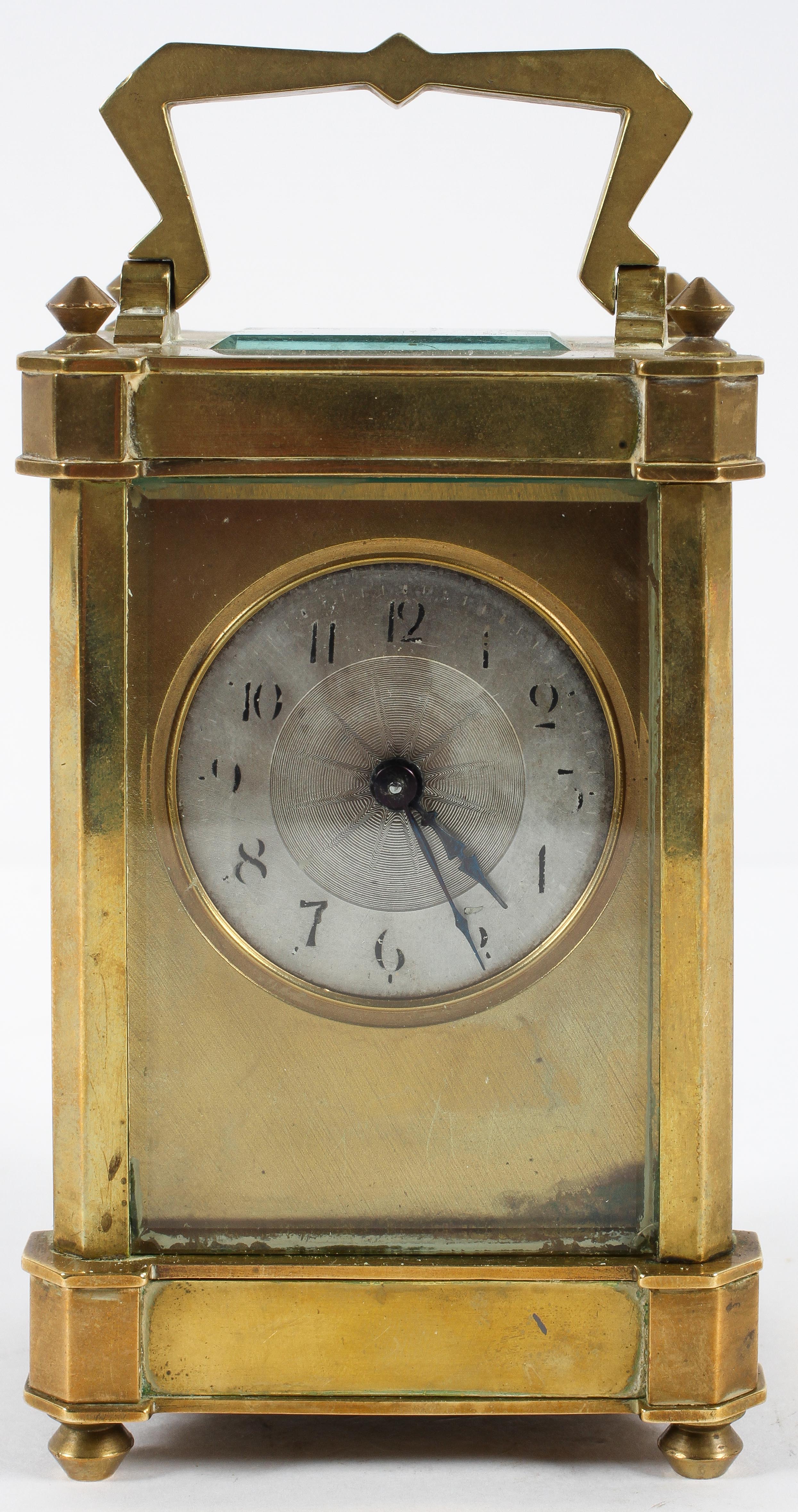 A French brass carriage time piece,