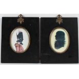 Two early silhouettes of a soldier and a gentleman, in 19th century style frames,
