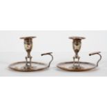 A pair of 19th century silver plated chamber sticks, possibly by Sissons,