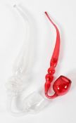 Two Victorian glass pipes, late 19th century, comprising : a Nailsea type pipe with opaque marbling,