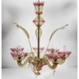 A 20th century Murano glass six branch chandelier with floral inserts,