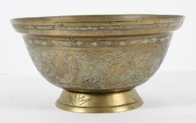 A Chinese brass bowl, with dragon and phoenix decoration in relief, cast mark to base,