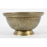 A Chinese brass bowl, with dragon and phoenix decoration in relief, cast mark to base,