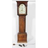 A 19th century oak long case clock, the enamel dial with Roman numerals denoting hours,