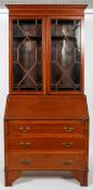 An Edwardian satinwood and inlaid bureau bookcase,