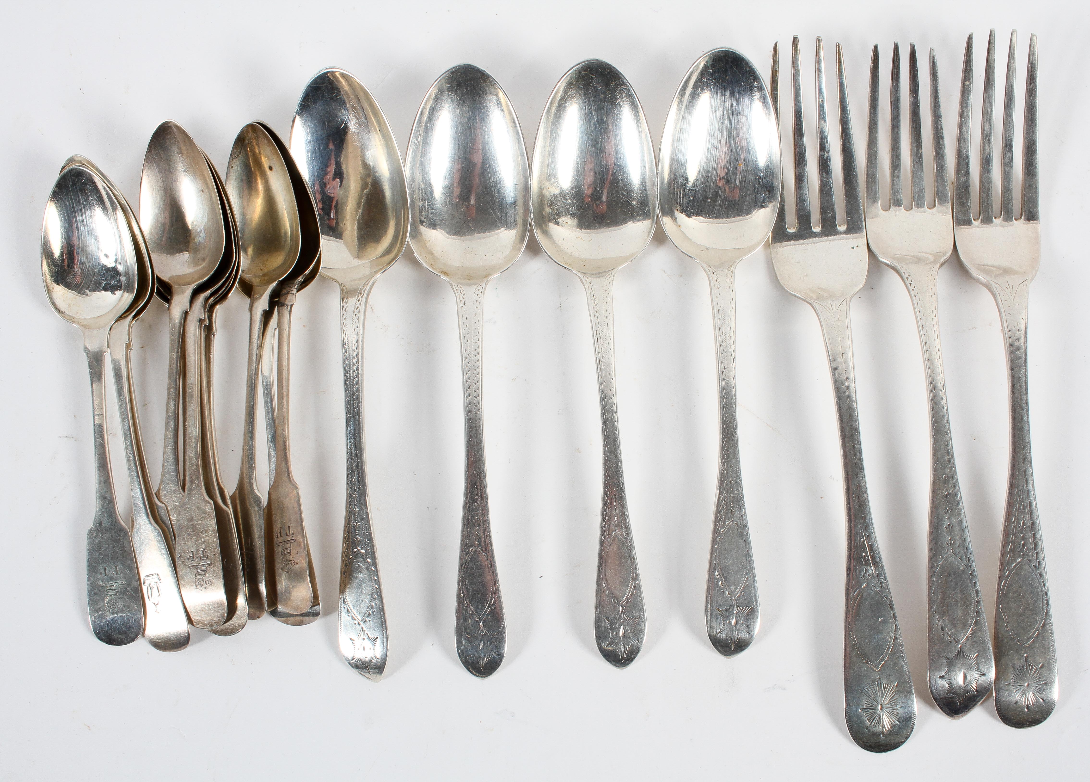A group of assorted Irish silver flatware, comprising : four Old English pattern dessert spoons,