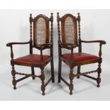 A pair of Victorian oak armchairs, in the 17th century style,