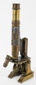 A Victorian brass microscope by J Parkes & Son (Birmingham), circa 1900,