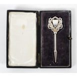 An unusual 19th century white metal key, possibly for a carriage, the pierced scrolled handle,
