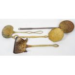 A collection of four brass skimmers, mainly 19th century,