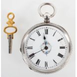 An open face pocket watch. White circular dial with floral design and Roman numerals.