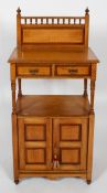 A Victorian satin pine washstand, with gallery back, two drawers and panelled cupboard,