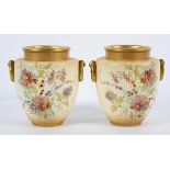 A pair of Royal Bonn bush ivory vases, with enamelled and gilt floral decoration,