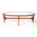 A 1960's vintage Stonehill teak wood oval coffee table with inset glass top