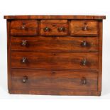 A Victorian mid 19th century chest of drawers with three short drawers above three long drawers,