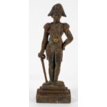 A Victorian cast iron door stop, in the form of a soldier in a bi-corn hat,