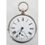 An open face pocket watch with white circular dial and Roman numerals.