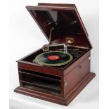 A Colombia Grafonda gramophone, with louvre front, wind handle andtwo tins of needles,