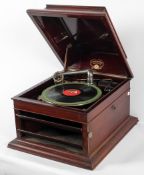 A Colombia Grafonda gramophone, with louvre front, wind handle andtwo tins of needles,