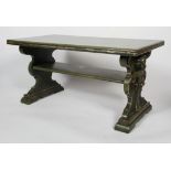A Renaissance style coffee table, with figural carved legs and shelf stretcher,