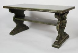 A Renaissance style coffee table, with figural carved legs and shelf stretcher,