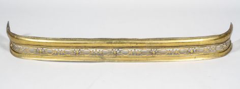 A Victorian brass fire fender, late 19th century,