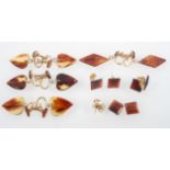 A collection of costume earrings in the style of tortoise shell.