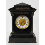 A brass mounted slate mantel clock, the white enamel dial inscribed by Charles Frodsham & Co,