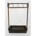 A Victorian painted brass stick stand, with tin drop tray,