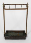 A Victorian painted brass stick stand, with tin drop tray,