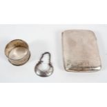 A shaped silver cigarette case, with hammered sunburst decoration, the interior in gilt,