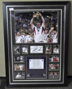 An England Rugby World Cup Champion 2003 Print, signed by Martin Johnson, in black silver frame,