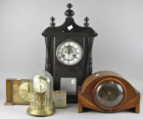A small walnut cased Vienna style wall clock,