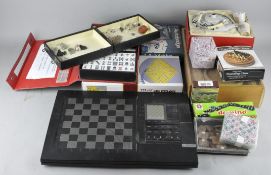An assortment of vintage games, including a Japanese Sake set,