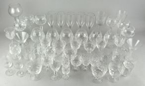 A large collection of drinking glasses, including cut glass,