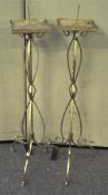 A pair of metal Pricket candlestick stands, painted gold,