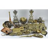 A quantity of brassware, including fire irons,