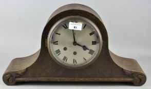 An early 20th century oak cased mantle clock, stamped GB to the dial,