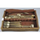 A collection of vintage brass cutlery, made in Thailand,