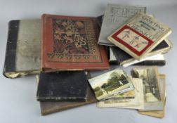 An old suitcase of early books and scrapbook,