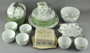 An early 20th century 'Foley' china dinner service with clover leaf decoration,