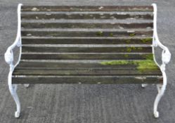 A white painted and slatted garden bench,