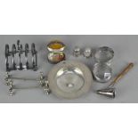 A collection of assorted silver items, including a small four slice toast rack,