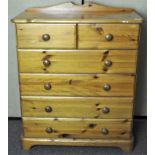 A pine chest of two short and three long drawers,