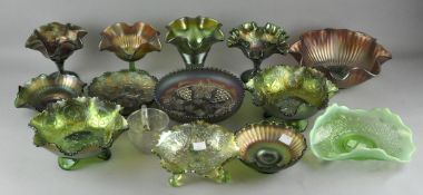 A collection of assorted green carnival glass,