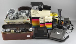 A group of Polaroid cameras,